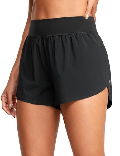 CRZ YOGA Short de course athlétique taille haute en forme de dauphin pour femme, fente haute, doublure en maille confortable, short de piste d'entraînement de gymnastique, noir, petit